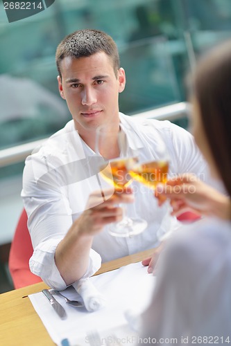 Image of couple having lanch at beautiful restaurant