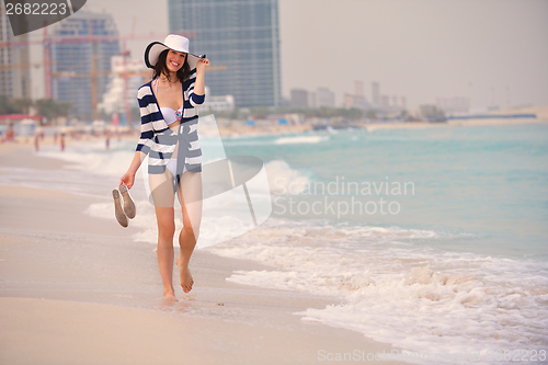 Image of Happy Beautiful Woman Enjoying Summer Vacation