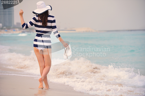 Image of Happy Beautiful Woman Enjoying Summer Vacation