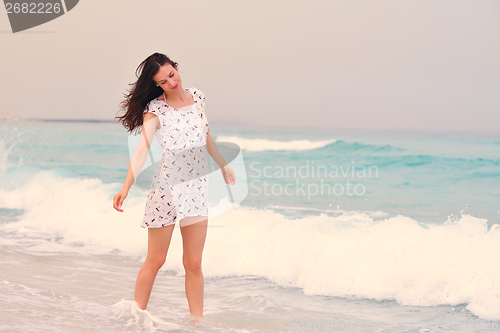 Image of Happy Beautiful Woman Enjoying Summer Vacation