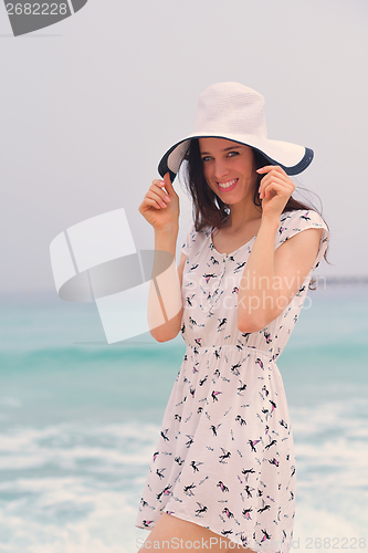 Image of Happy Beautiful Woman Enjoying Summer Vacation