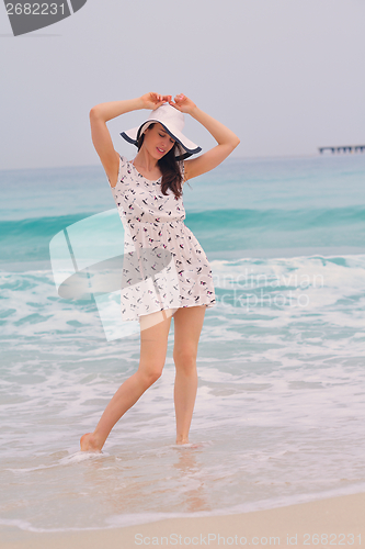 Image of Happy Beautiful Woman Enjoying Summer Vacation