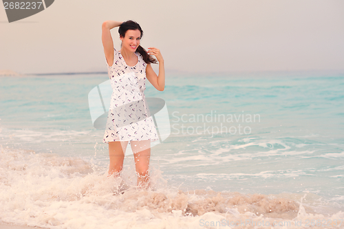 Image of Happy Beautiful Woman Enjoying Summer Vacation