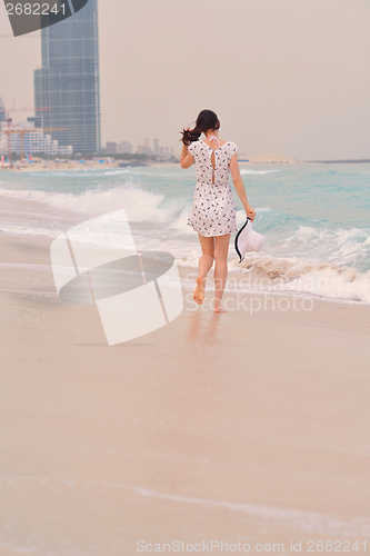 Image of Happy Beautiful Woman Enjoying Summer Vacation