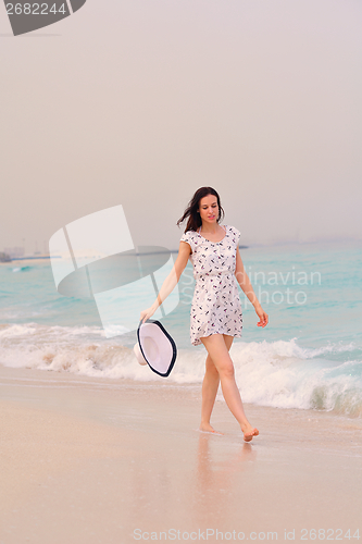 Image of Happy Beautiful Woman Enjoying Summer Vacation