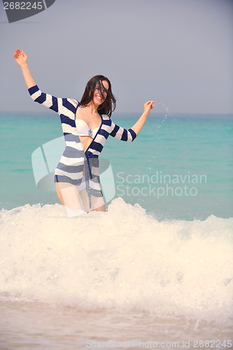 Image of Happy Beautiful Woman Enjoying Summer Vacation