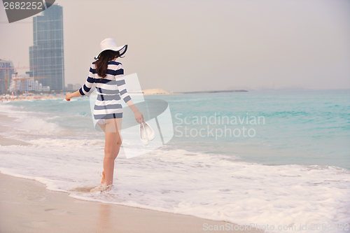 Image of Happy Beautiful Woman Enjoying Summer Vacation
