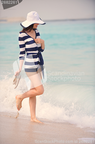 Image of Happy Beautiful Woman Enjoying Summer Vacation