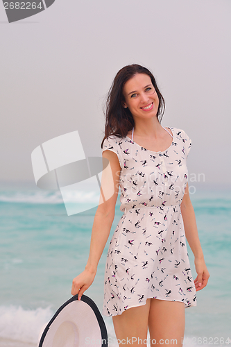 Image of Happy Beautiful Woman Enjoying Summer Vacation