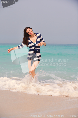 Image of Happy Beautiful Woman Enjoying Summer Vacation