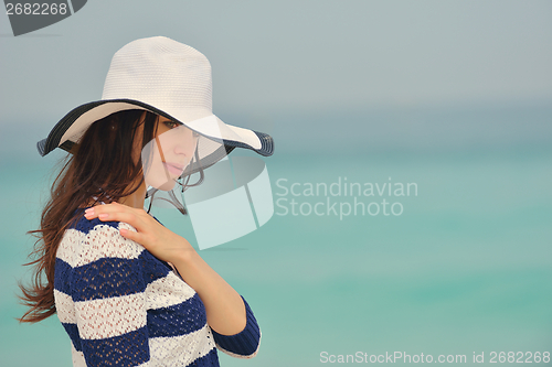 Image of Happy Beautiful Woman Enjoying Summer Vacation