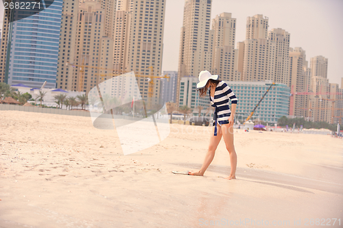 Image of Happy Beautiful Woman Enjoying Summer Vacation