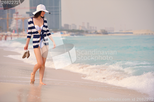 Image of Happy Beautiful Woman Enjoying Summer Vacation