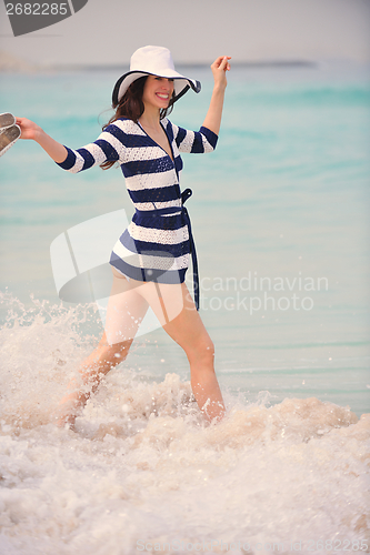 Image of Happy Beautiful Woman Enjoying Summer Vacation
