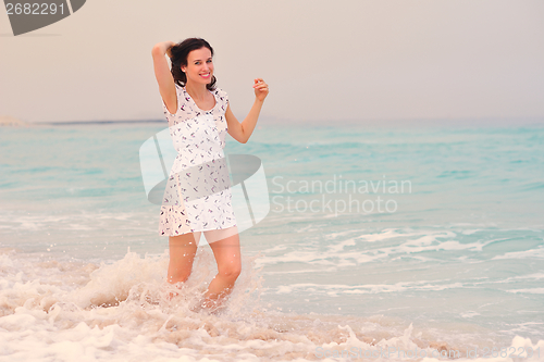Image of Happy Beautiful Woman Enjoying Summer Vacation