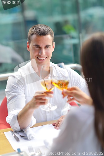 Image of couple having lanch at beautiful restaurant