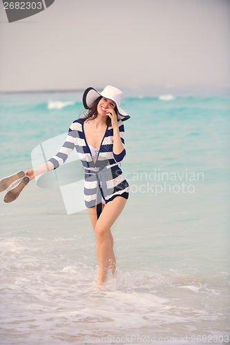 Image of Happy Beautiful Woman Enjoying Summer Vacation