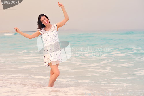 Image of Happy Beautiful Woman Enjoying Summer Vacation