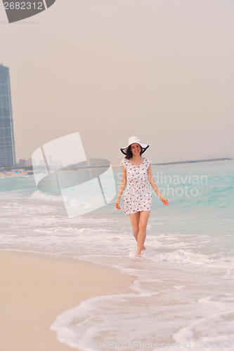 Image of Happy Beautiful Woman Enjoying Summer Vacation