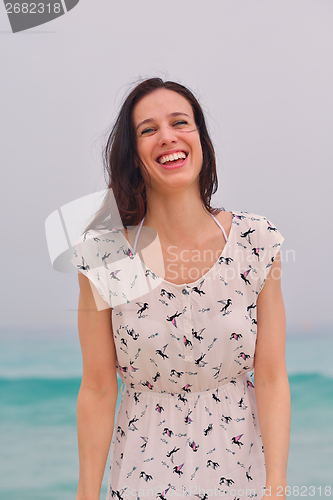 Image of Happy Beautiful Woman Enjoying Summer Vacation