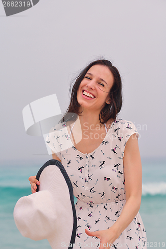 Image of Happy Beautiful Woman Enjoying Summer Vacation