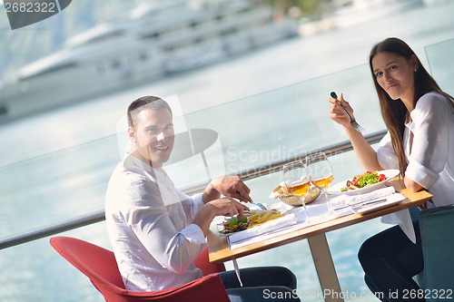 Image of couple having lanch at beautiful restaurant