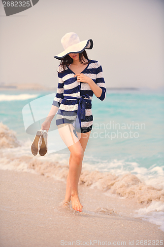 Image of Happy Beautiful Woman Enjoying Summer Vacation