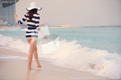 Image of Happy Beautiful Woman Enjoying Summer Vacation