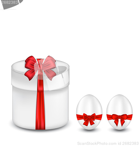 Image of Easter gift box with red bow and eggs