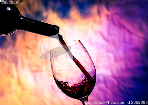 Image of Red Wine Poured into Wineglass