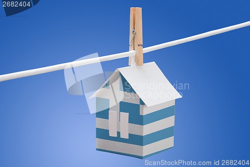 Image of Greek flag printed on paper house