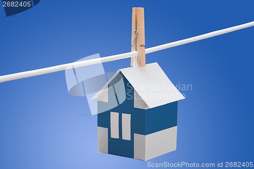 Image of finland flag printed on paper house