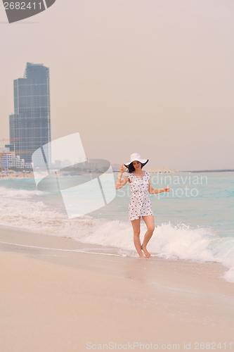 Image of Happy Beautiful Woman Enjoying Summer Vacation