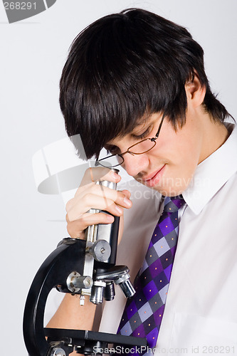 Image of boy with microscope