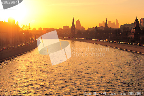 Image of Moscow Kremlin and the Moskva river seen from Bolshoy Moskvoretsky Bridge under the rays of the evening sun