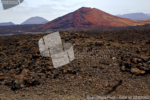 Image of volcanic stone in los volcanes  rock  sky  hill and summer 