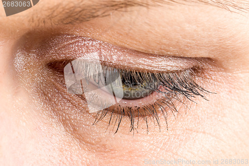 Image of middle age woman eye macro