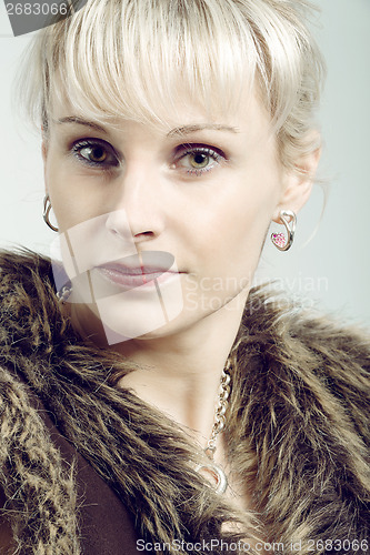 Image of studio portrait of beautiful woman