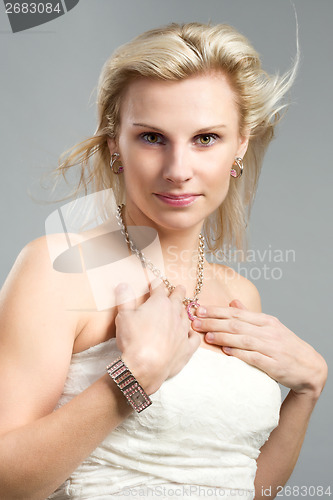 Image of studio portrait of beautiful woman