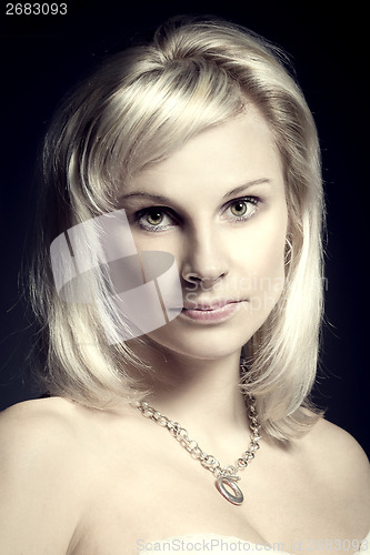 Image of studio portrait of beautiful woman