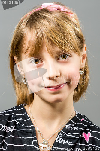 Image of Studio portrait of young beautiful girl