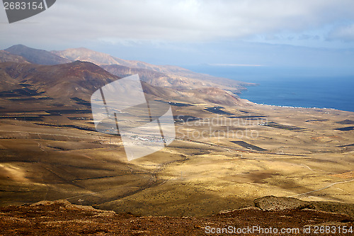 Image of lanzarote  house field coastline