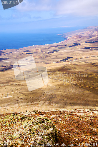 Image of coastline lanzarote view from the top  and house field 
