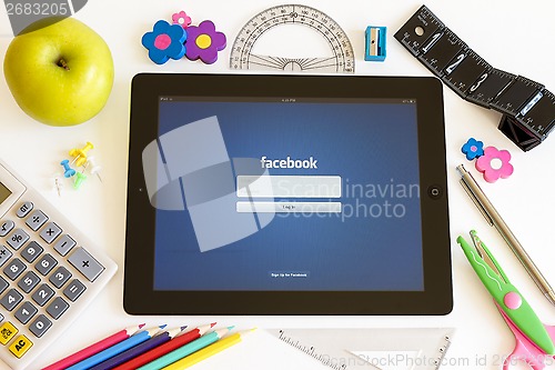 Image of Facebook on Ipad 3 with school accesories