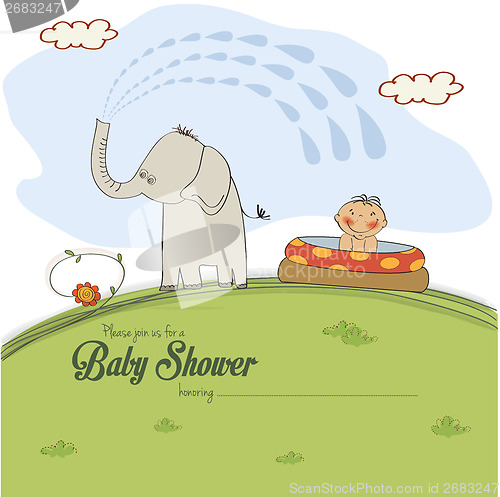 Image of baby shower card with a small boy sprayed by an elephant
