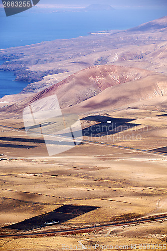 Image of view from the top in lanzarote  and house field coastline