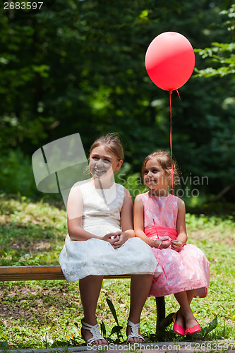 Image of Two girls in park