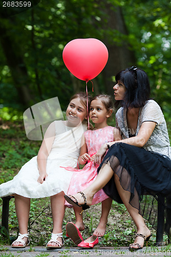 Image of Mother and two children