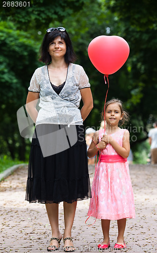 Image of Mother and daughter in park