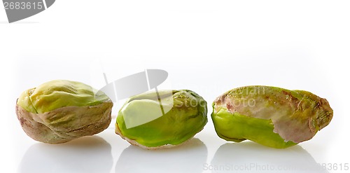 Image of pistachios on a white background